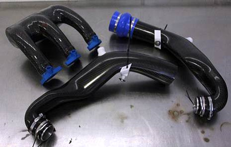 Variety of complex, composite ducts created using Stratasys 3D printed soluble cores