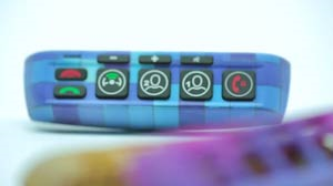 Product-matching 3D printed prototype keypad for automotive emergency response system produced on the Stratasys J750 3D Printer, featuring soft-touch buttons, backlighting and color textures