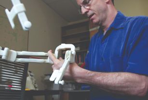 A custom 3D-printed version of the Wilmington Robotic Exoskeleton (WREX) empowers little Emma to use her arms despite arthrogryposis.