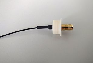 Isolator for SMA socket