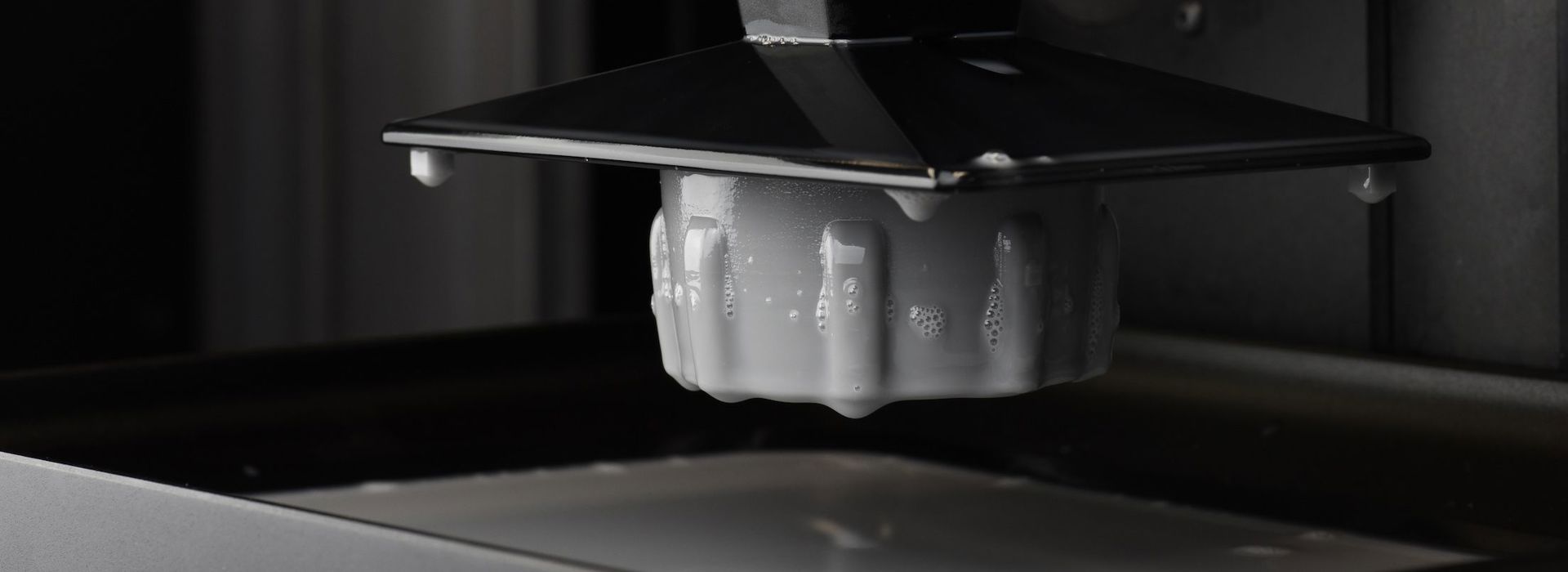 Origin One 3D printer close-up.