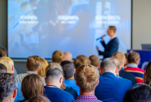 A completed part is automatically ejected from the build chamber