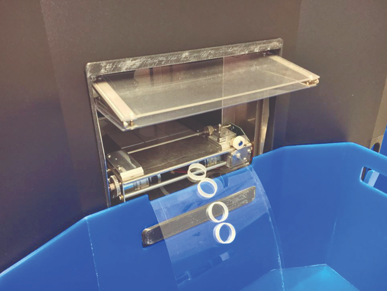 A completed part is automatically ejected from
the build chamber.