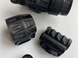Disassembled 3D printed scope for a firearm printed by Stratasys