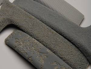 Automotive door panel handle