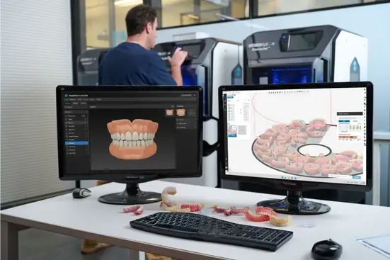 Dental technician reviewing a full-arch case in GrabCAD Print during the dental print workflow