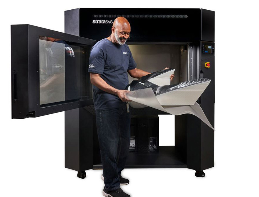 Stratasys F770 printer image with man.
