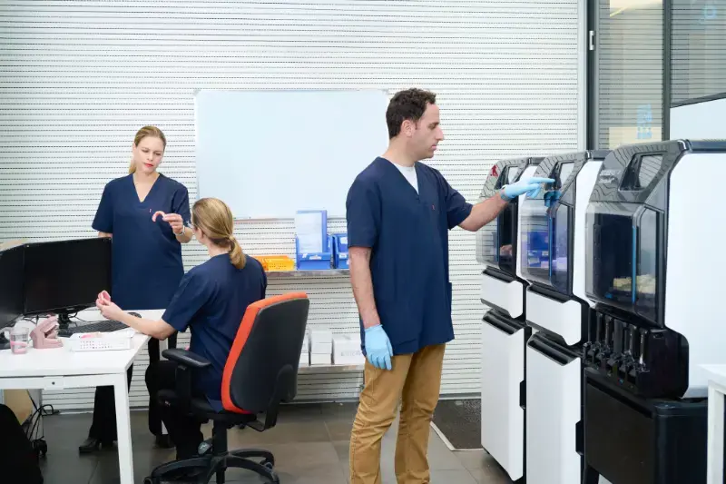team at work in a lab truedent