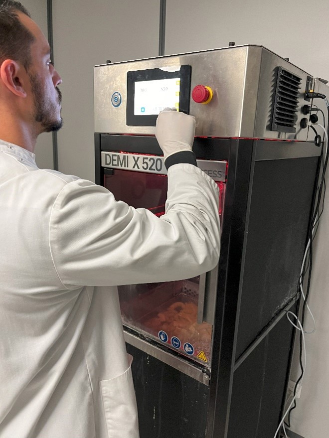 Operator 3D Printing Dentures using Stratassy J5 DentaJet Printer