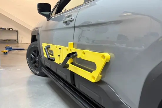 Stratasys FDM 3D printed mounting tool with magnets used by Subaru