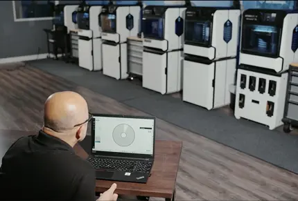 one-dental-lab-tech-managing-dentajet-printer