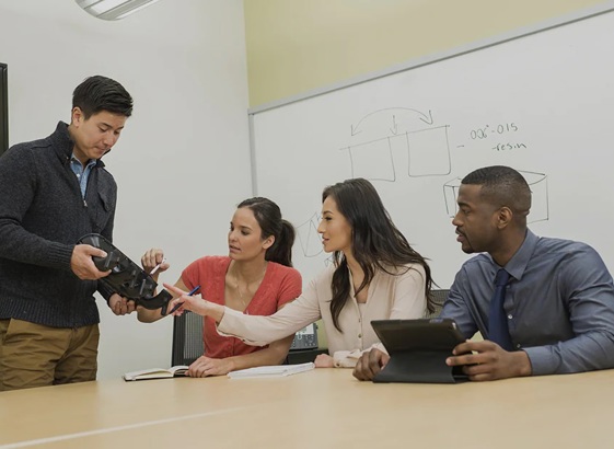 group discussing rapid prototyping